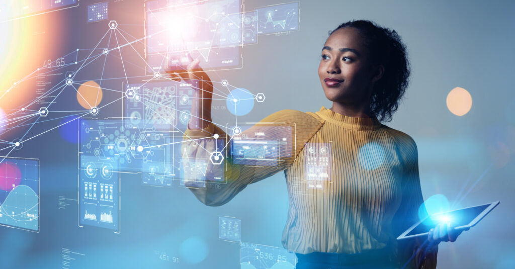 A woman works with digital technologies, representing three crucial strategies for seamless integration of generative AI.